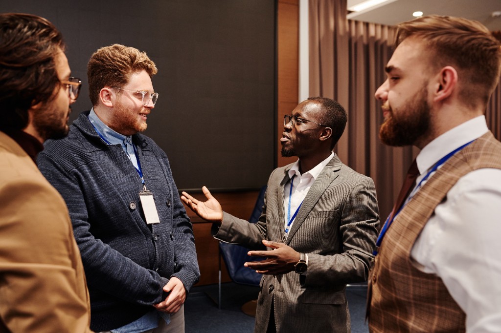Colleagues talking together at a corporate event